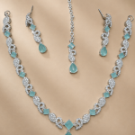 Elegant Aqua Blue Crystal Necklace Set with Matching Earrings & Tikka